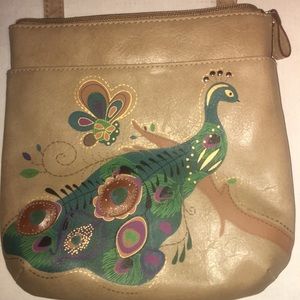 Peacock tan satchel