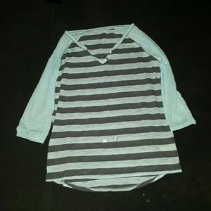 Turquoise and Gray top.