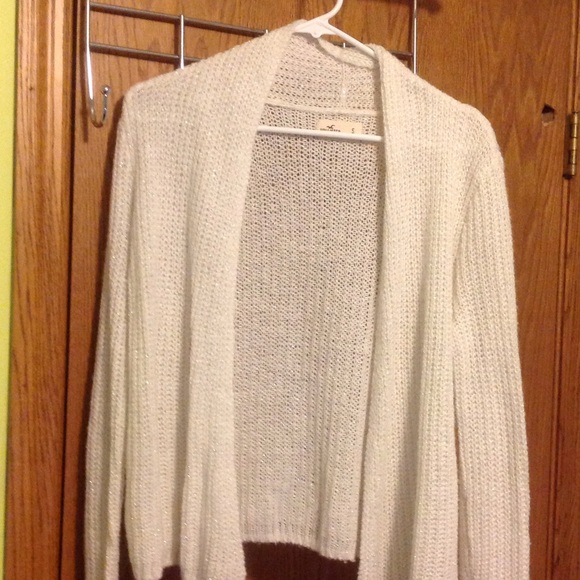 White Hollister sparkly sweater.