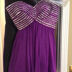 Brand name dresses. Only worn once.