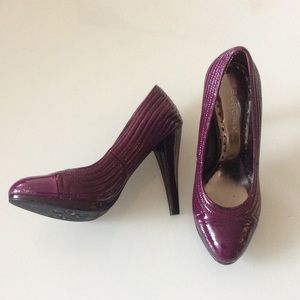 Purple patent leather pumps