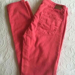 Coral AE skinny jeans