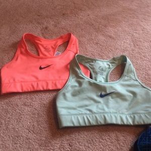 Two Nike sports bras. Size xs. Includes both