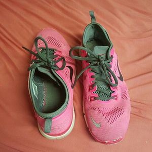 Pink Nike running shoes