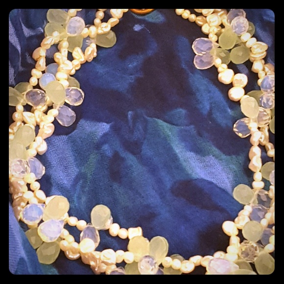 Multi-strand ice blue tone necklace