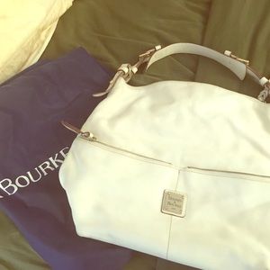 White leather Dooney & Bourke satchel.