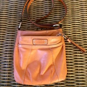 Tignanllo cross body purse