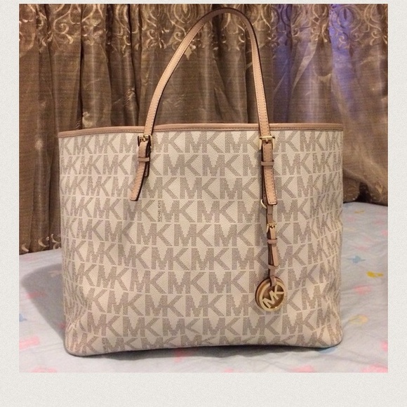 Michael Kors Handbags - Authentic Michael Kors Vanilla MD travel tote