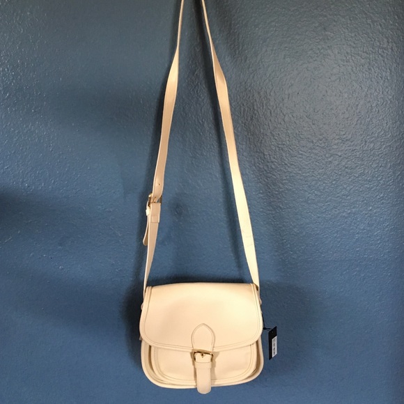 creme cross body bag