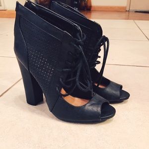 Black cutout lace up shoes