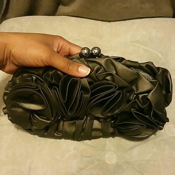 Miztique flower clutch with metal strap