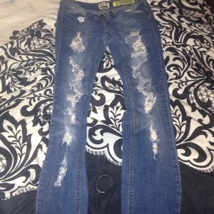Ripped/medium blue skinny jeans