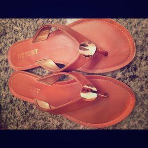 Report brown flip flops