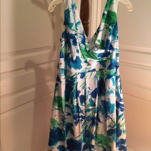 lined dress with loose box pleats at waist.