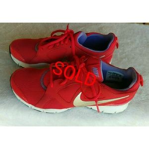 Coral Nike's Women's Running Shoes