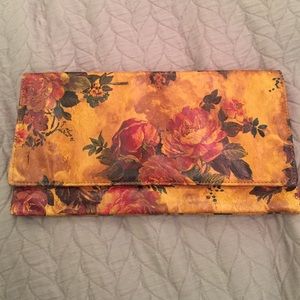 Vintage inspired handmade leather clutch
