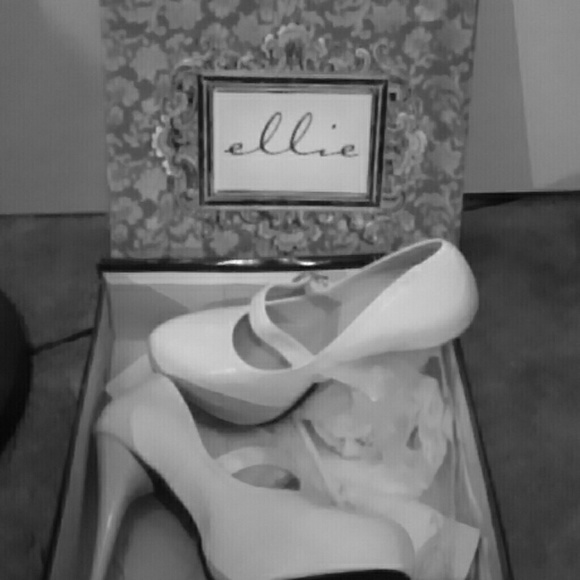 White heeled Mary Jane shoes