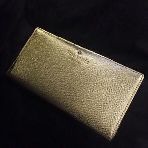 Brand new!!! Kate spade gold wallet