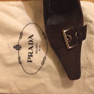 Chocolate brown suede Prada pumps.