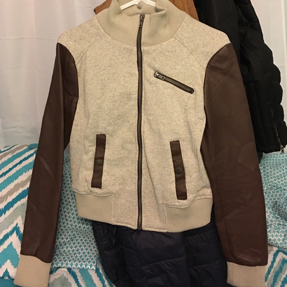 A cloth/leather brown tan jacket.