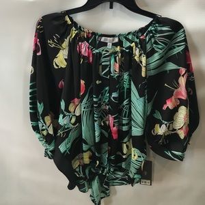 Beautiful Sheer Jennifer Lopez Flouncy Orchid Top