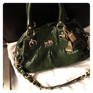 Green latent leather Coach purse.