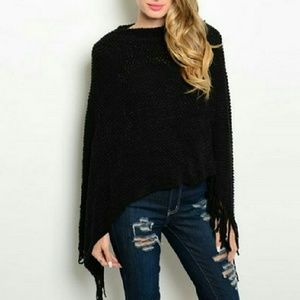 Black poncho with fringe