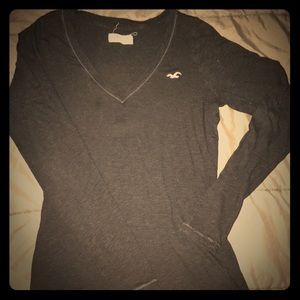 Long sleeve navy blue shirt.