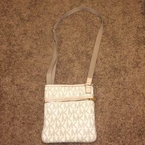 Michael Kors adjustable crossbody purse.