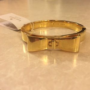 Kate Spade New York gold hinged bow bangle