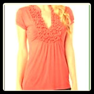 Pink & brown polka dot ruffle front top.