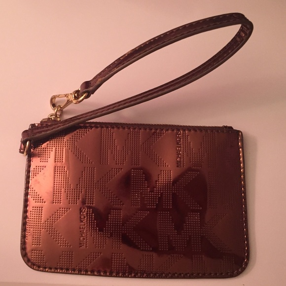 Michael Kors wristlet rose gold