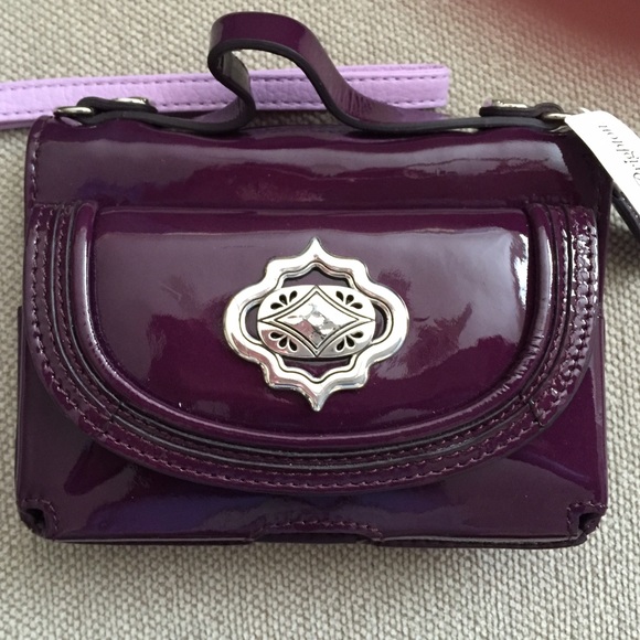 Purple purse. Comes with detachable strap.