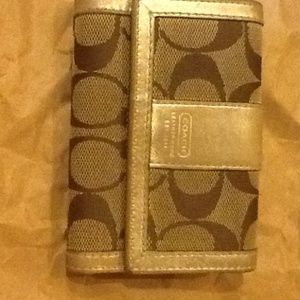 Gold Coach signature wallet