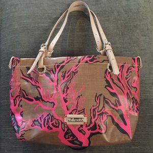 Tan and deep coral color purse with coral print.