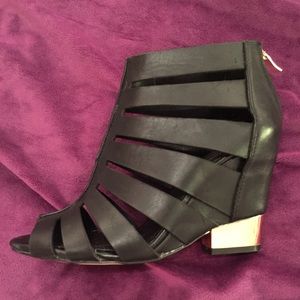 BCBG genuine leather black booties