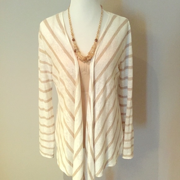 Calypso beige and white flowy sweater.