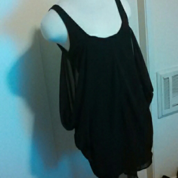 Black dress with sheer draping fabric