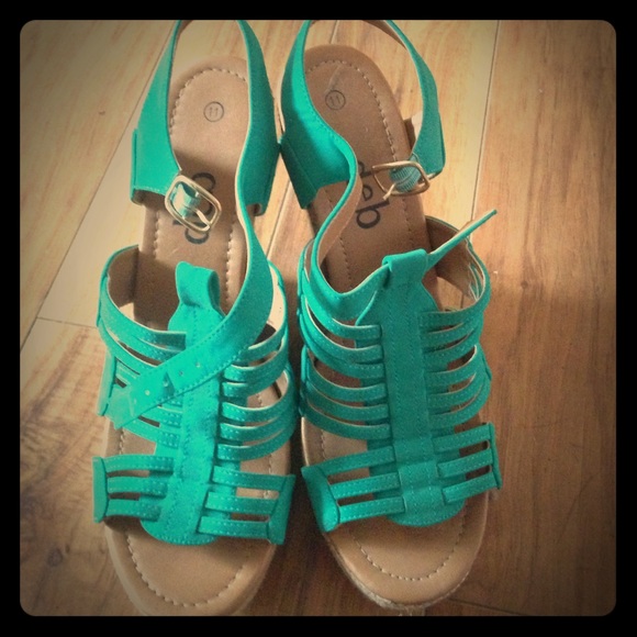Size 11 Deb wedges. Never worn. Sea foam green.