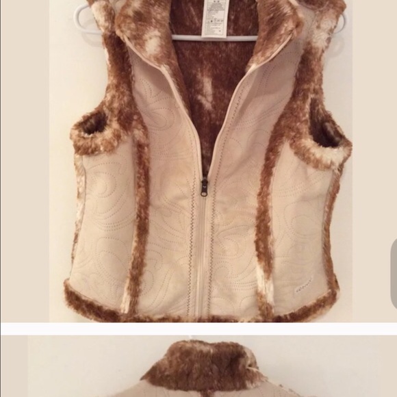 Ariat vest! Re posh. Love it doesn't fit me!