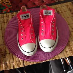 Hot pink converse low top slip-ons
