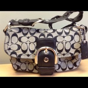 Coach /soho signature flap pocket baguette purse