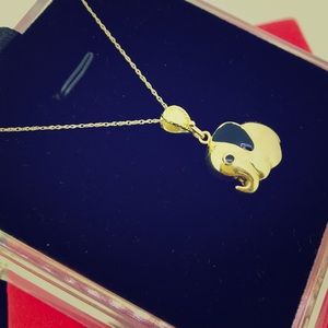 Baby elephant pendent in 18karat yellow gold