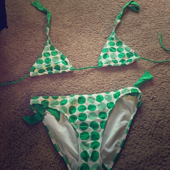 Green and white bathing suit
