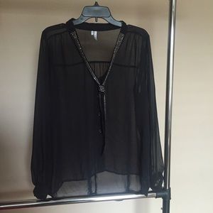 Sheer black studded blouse