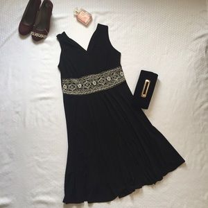 Like new Dress Barn embellished black dress.
