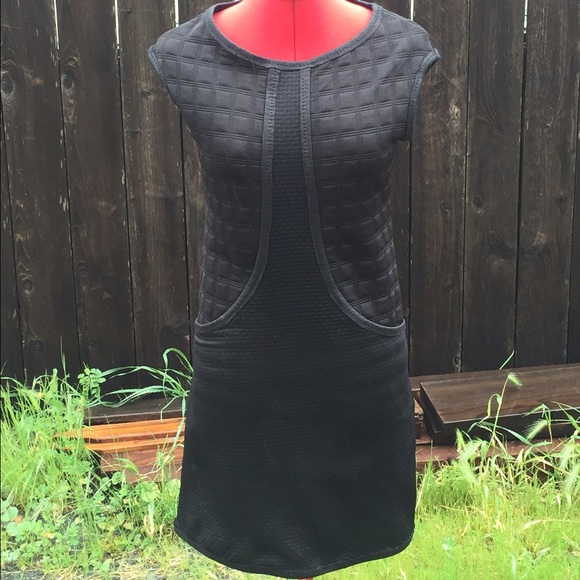 Black quilted shift with pleather trim