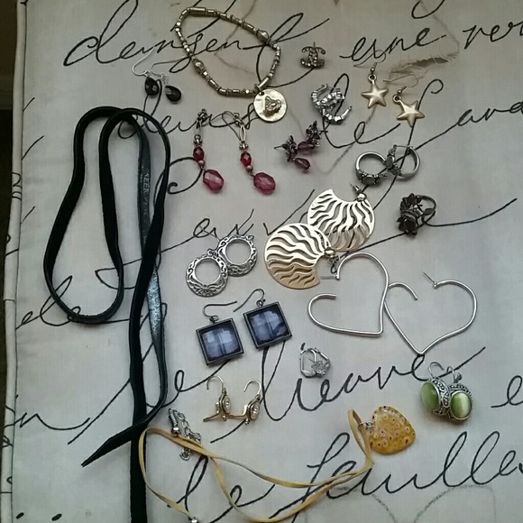 A bundle of jewelry!  Earrings, ring, neck.