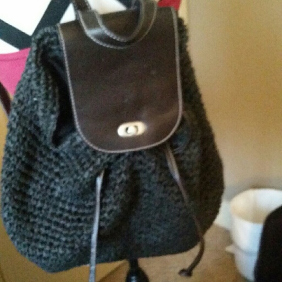 Black backpack beach bag with leather detailing
