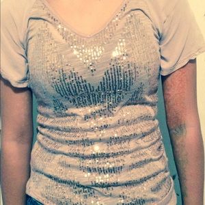 Cute top,sequins on front slightly
